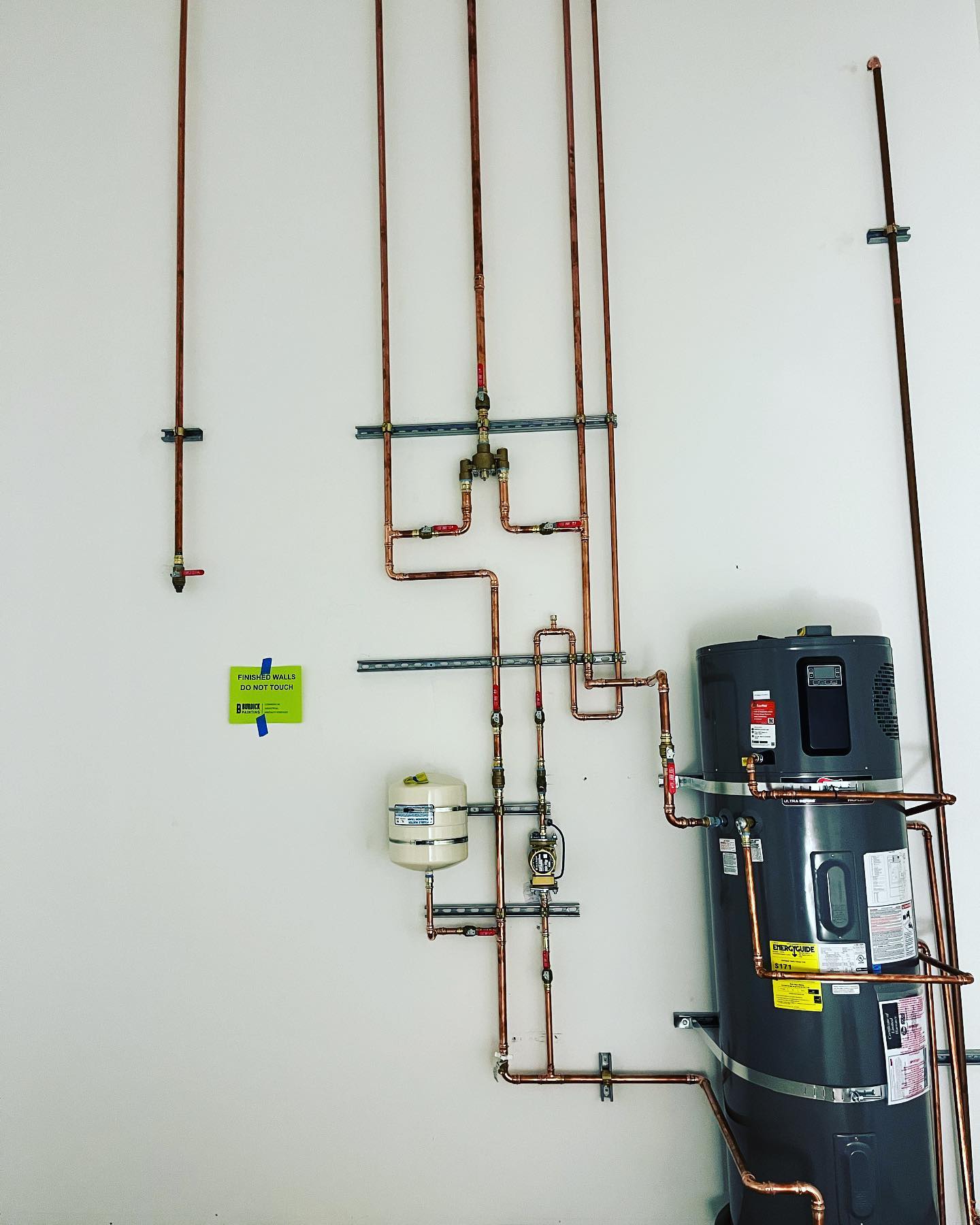 Large 80-gallon water heater installed by Prime Time Plumbing