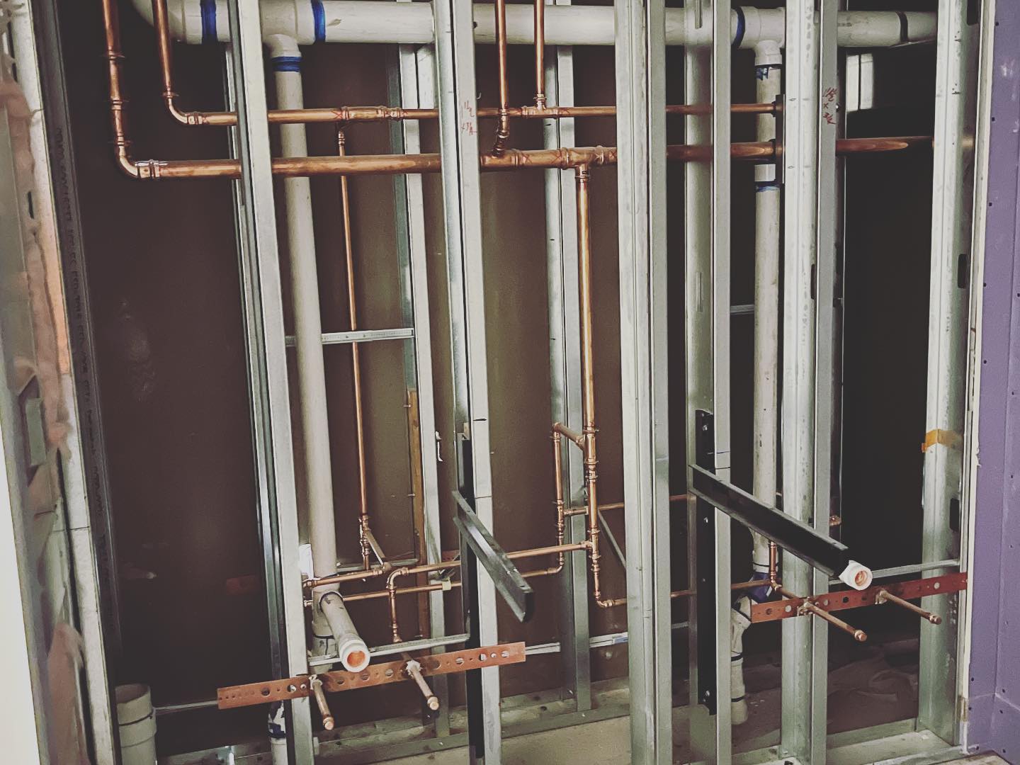 Commercial multi-lavatory drain rough-in by Prime Time Plumbing
